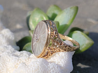 14k yellow gold c.1920's filigree mine cut diamond & quartz crystal ring