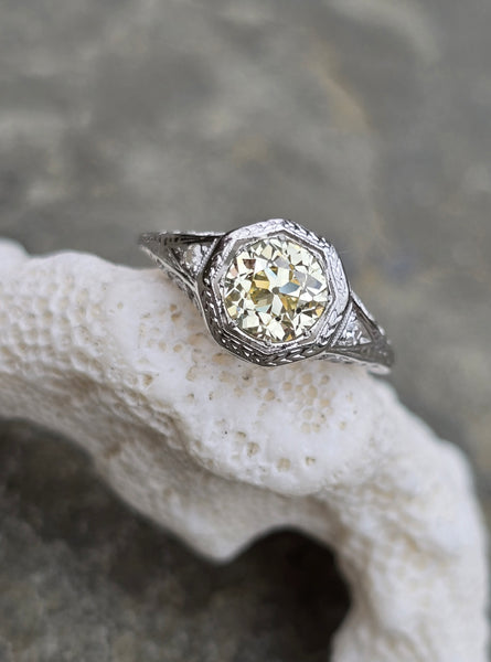 18k white gold c.1910-c.1920's .98ct very light yellow mine cut diamond filigree ring