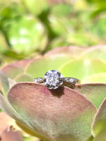 Platinum and 18ct two tone Edwardian old mine cut diamond engagement ring