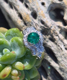 Platinum Art Deco emerald and diamond estate ring