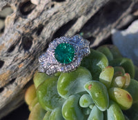 Platinum Art Deco emerald and diamond estate ring