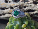 Platinum Art Deco emerald and diamond estate ring