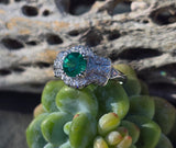 Platinum Art Deco emerald and diamond estate ring