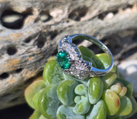 Platinum Art Deco emerald and diamond estate ring