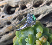 Platinum Art Deco emerald and diamond estate ring