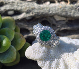 Platinum Art Deco emerald and diamond estate ring