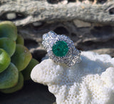 Platinum Art Deco emerald and diamond estate ring