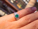 Platinum Art Deco emerald and diamond estate ring