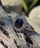 platinum blue sapphire and diamond halo antique ring