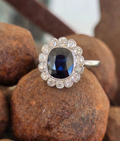 platinum blue sapphire and diamond halo antique ring