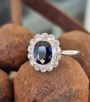 platinum blue sapphire and diamond halo antique ring