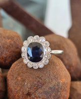 platinum blue sapphire and diamond halo antique ring