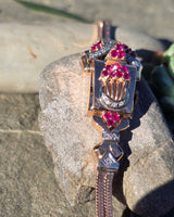 14k rose gold Retro mid-century c.1940's - 1950's ruby and diamond estate concealed cover hidden RIMA watch