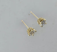 14k gold European cut diamond scroll studs - .61ct tw