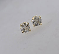 14k gold European cut diamond scroll studs - .61ct tw