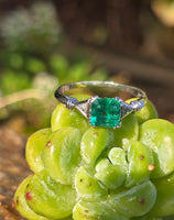 platinum emerald and diamond estate ring