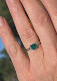 platinum emerald and diamond estate ring